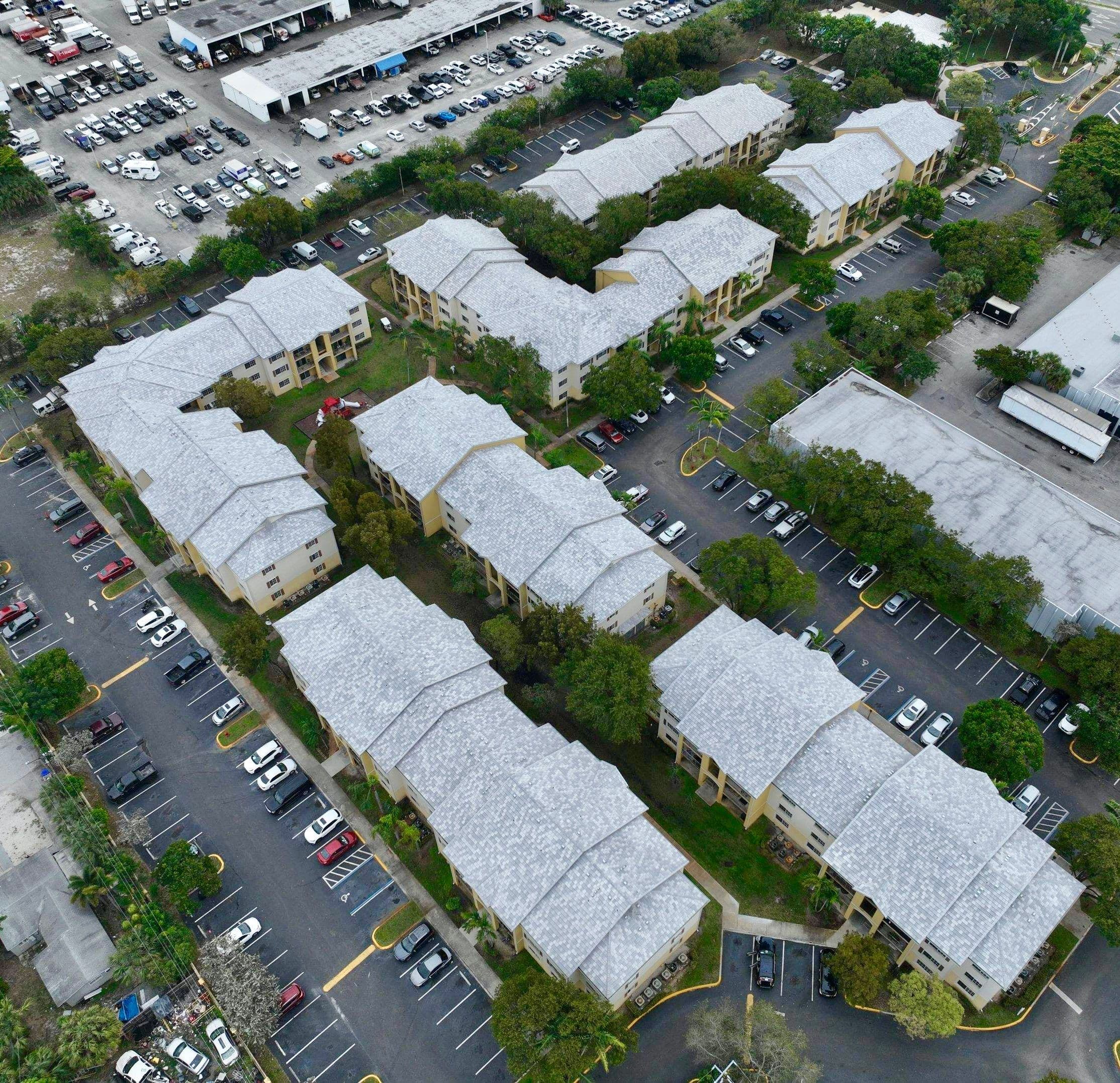 Aerial view of a completed 88,490 sq ft tile re-roof across a multifamily property