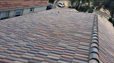 Completed concrete tile roof replacement on a South Florida single-family home — representative of Roofweiler's Palm Beach County work. License CCC1337426
